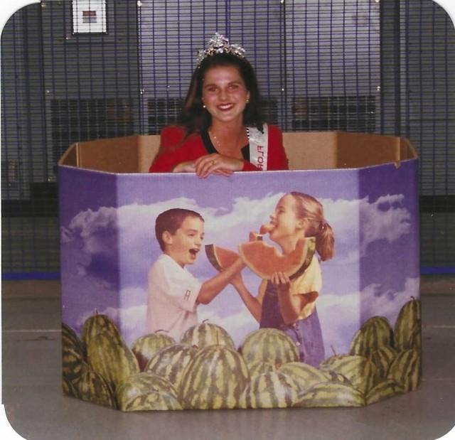 Heather Raulerson posing inside of a bulk bin